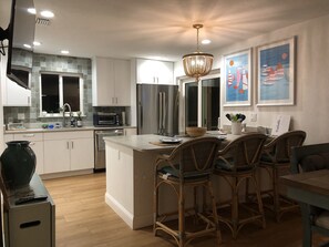 Fridge, microwave, oven, stovetop - Steps From the Beach With Saltwater Heated Pool (Ormond Beach)