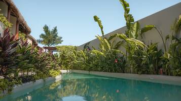 2 outdoor pools, open 8:00 AM to 6:00 PM, pool umbrellas, pool loungers