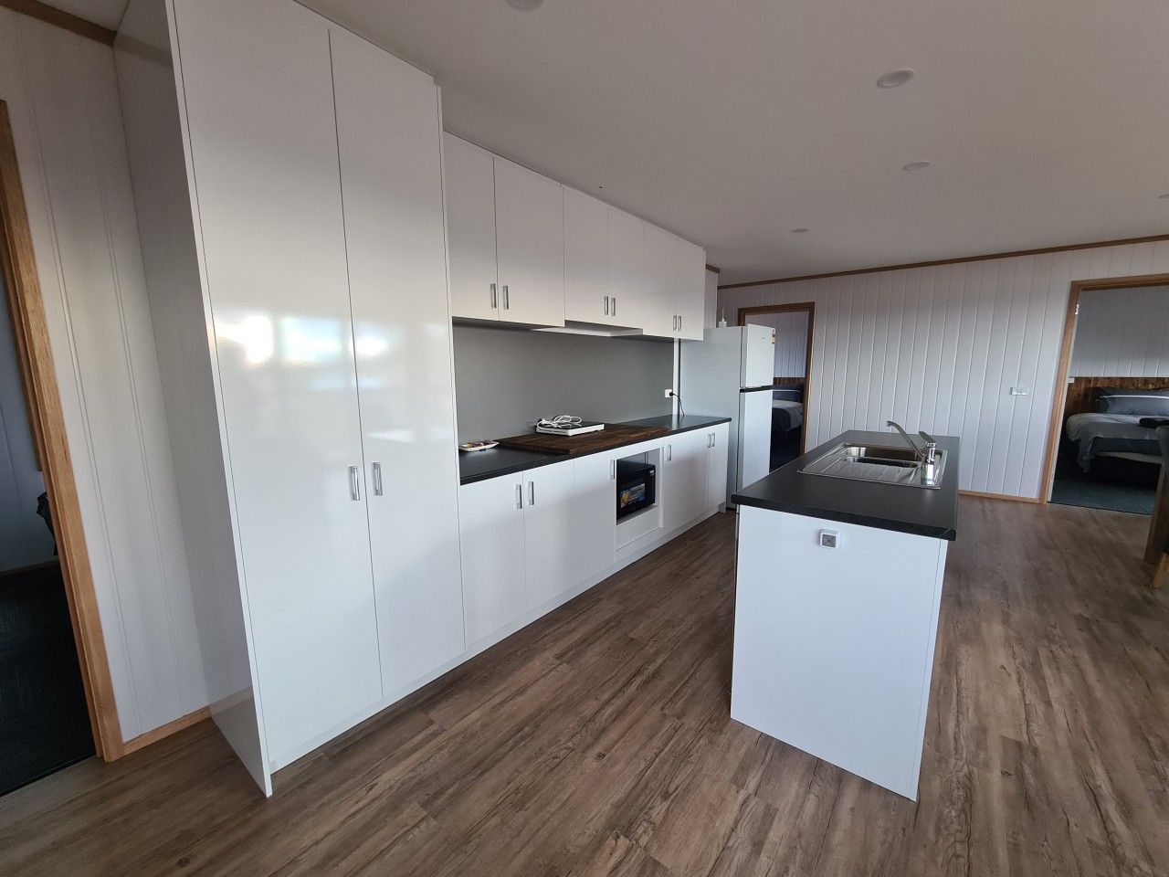 Fully equipped kitchen with plenty of space to prepare meals during your stay.