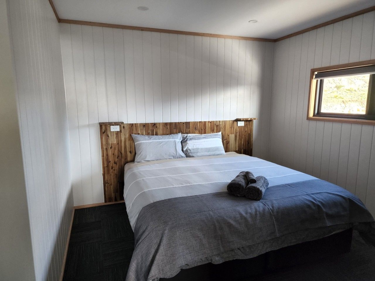 Comfortable bedroom with a cosy king bed