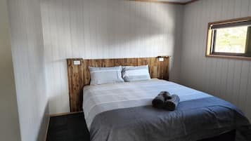Comfortable bedroom with a cosy king bed