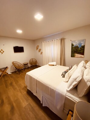 Suíte 103 Quarto Duplo Deluxe com vista do mar | Ropa de cama de alta calidad, camas con pillow-top y minibar 