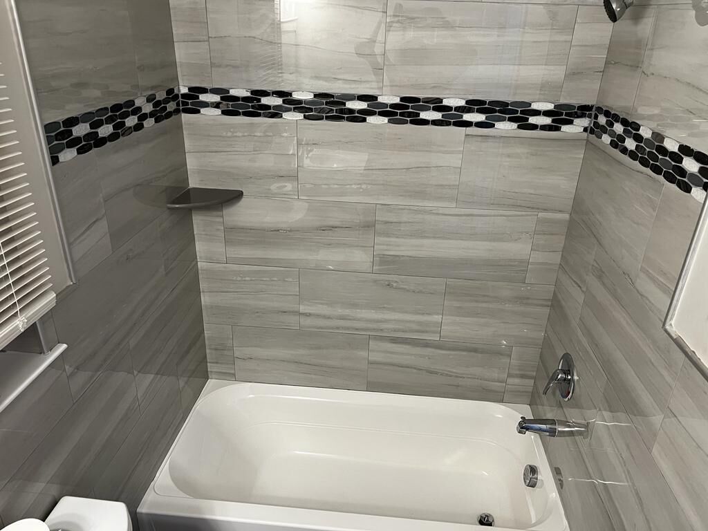 Relax in this cozy newly  built 3-bedroom unit with 2bathrooms.