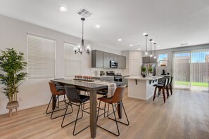 Fridge, microwave, oven, stovetop - Cheerful 4 Bedroom Home w/ Indoor Fireplace (North Las Vegas)