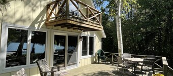 Waterfront, relaxing sunset cottage on Lake Leelanau w/3 bedrooms & 2 bathrooms.