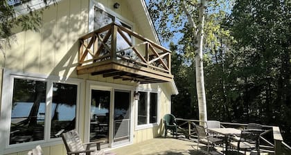 Waterfront, relaxing sunset cottage on Lake Leelanau w/3 bedrooms & 2 bathrooms.