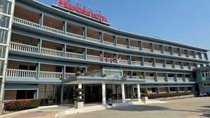A multi-story hotel with a prominent sign reading "MAEKONG HOTEL".