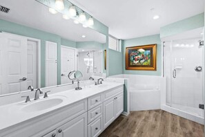 Shower, hair dryer, towels, shampoo