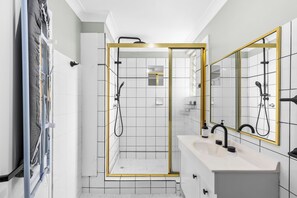 Bathtub, hair dryer, towels, soap