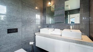 Shower, free toiletries, hair dryer, towels