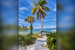 Relax beside the water at the property’s private beach area, conveniently located within the complex