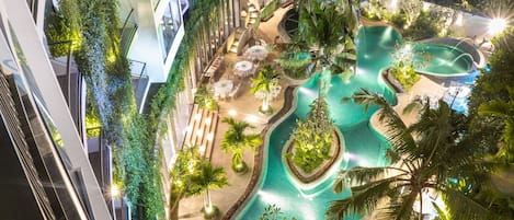 Outdoor pool, open 7:00 AM to 10:30 PM, free pool cabanas