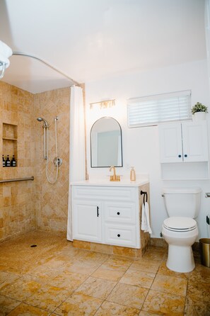 Shower, hair dryer, towels, soap