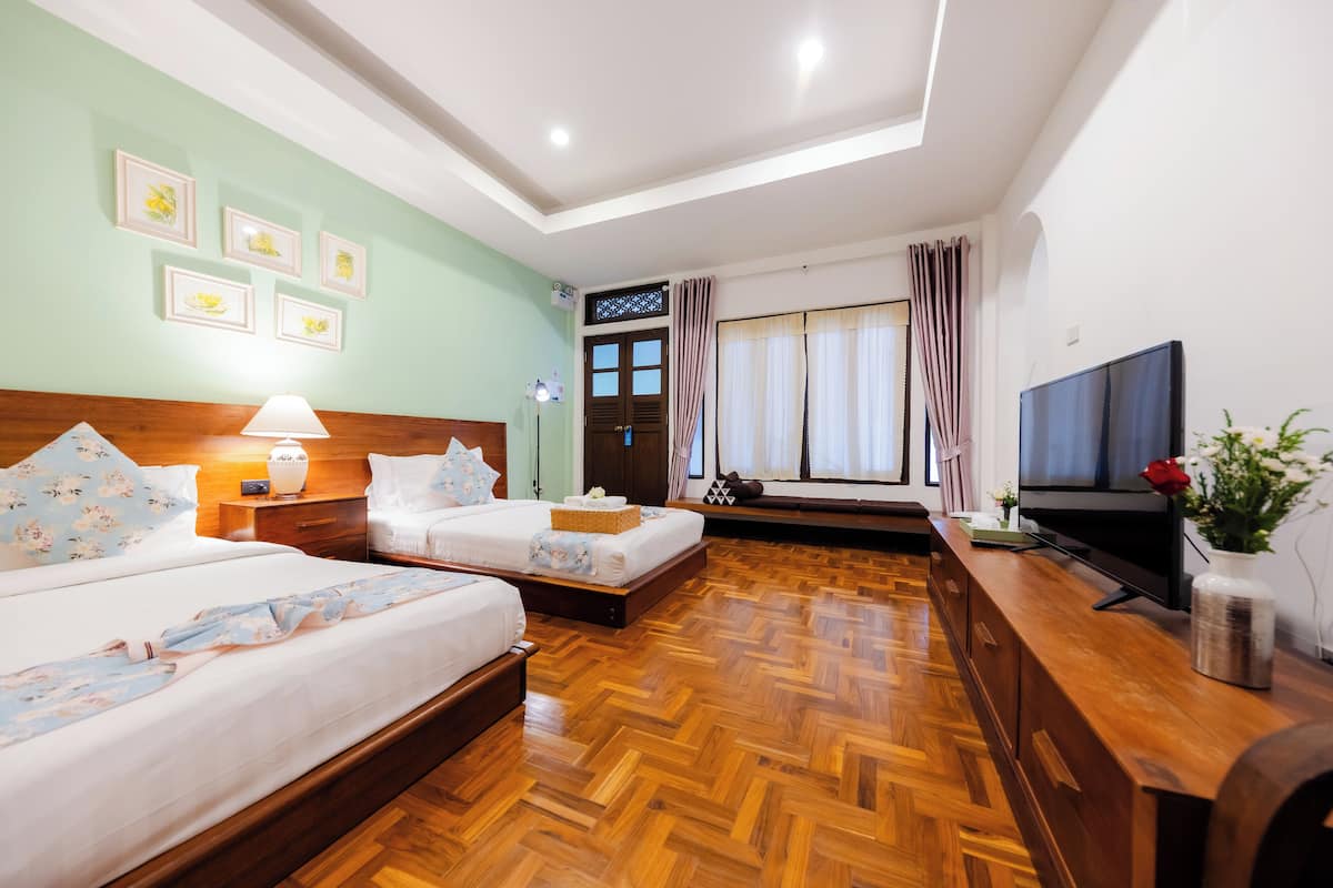 Chambre Deluxe avec lits jumeaux | Bureau, Wi-Fi gratuit