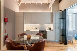 Dúplex Deluxe, mezzanine | Área de sala de estar