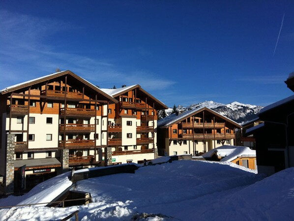 Experience the charm of the Alps from this traditional hotel, surrounded by majestic mountains.
