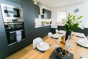 Fridge, oven, dishwasher, highchair
