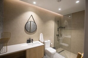 Shower, hair dryer, towels, soap