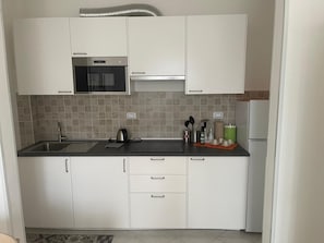 Appartamento familiare | Cucina privata | Frigorifero con congelatore, microonde, forno, piano cottura