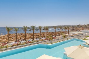 On the beach, sun loungers, beach umbrellas, beach towels