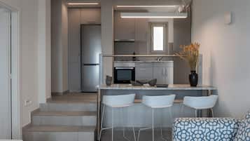 Departamento ejecutivo | Cocina privada | Refrigerador con congelador, horno y parrilla de estufa