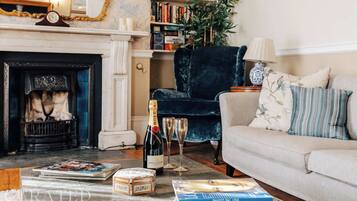 TV, fireplace, books, offices