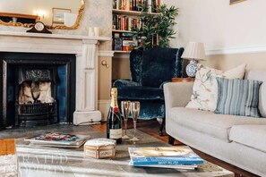 TV, fireplace, books, offices