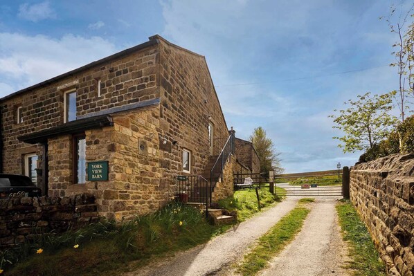 A stone building with a sign reading 'York View Barn.'