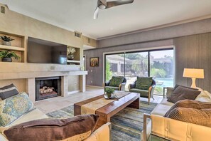 TV, fireplace, books - Pool, Grill & Game Room: Bermuda Dunes Oasis (Bermuda Dunes)
