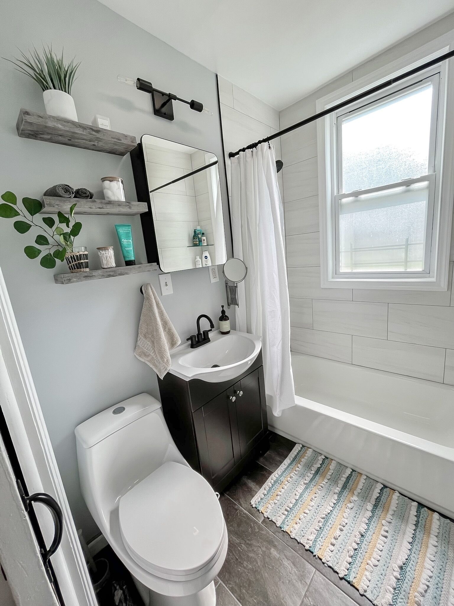 Bathtub, hair dryer, towels, soap