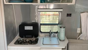 Fridge, microwave, stovetop, coffee/tea maker