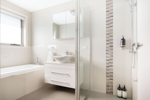 Bathtub, hair dryer, towels
