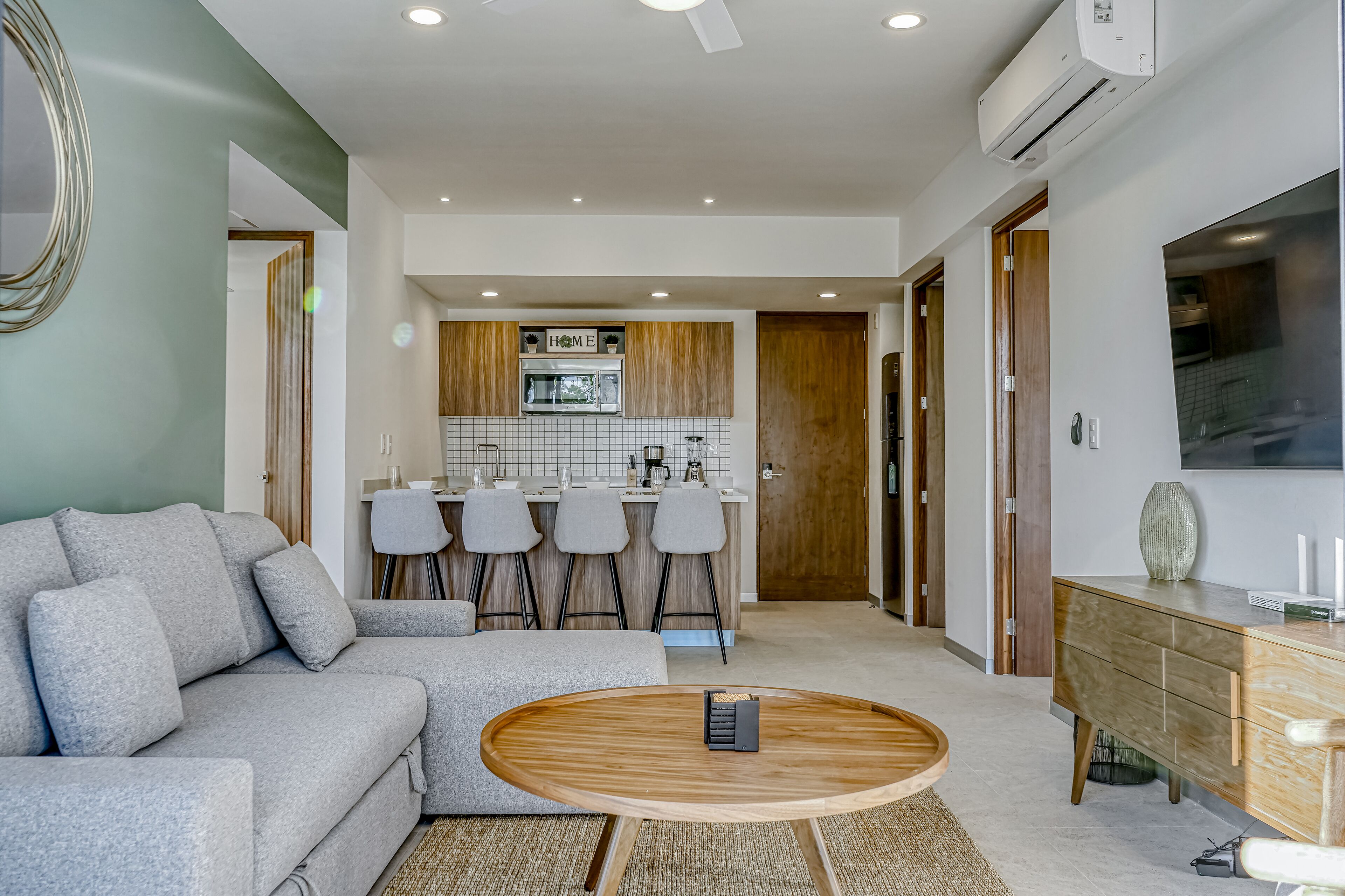 Chic condo with rooftop & courtyard pools, private balcony, & W/D - near beach