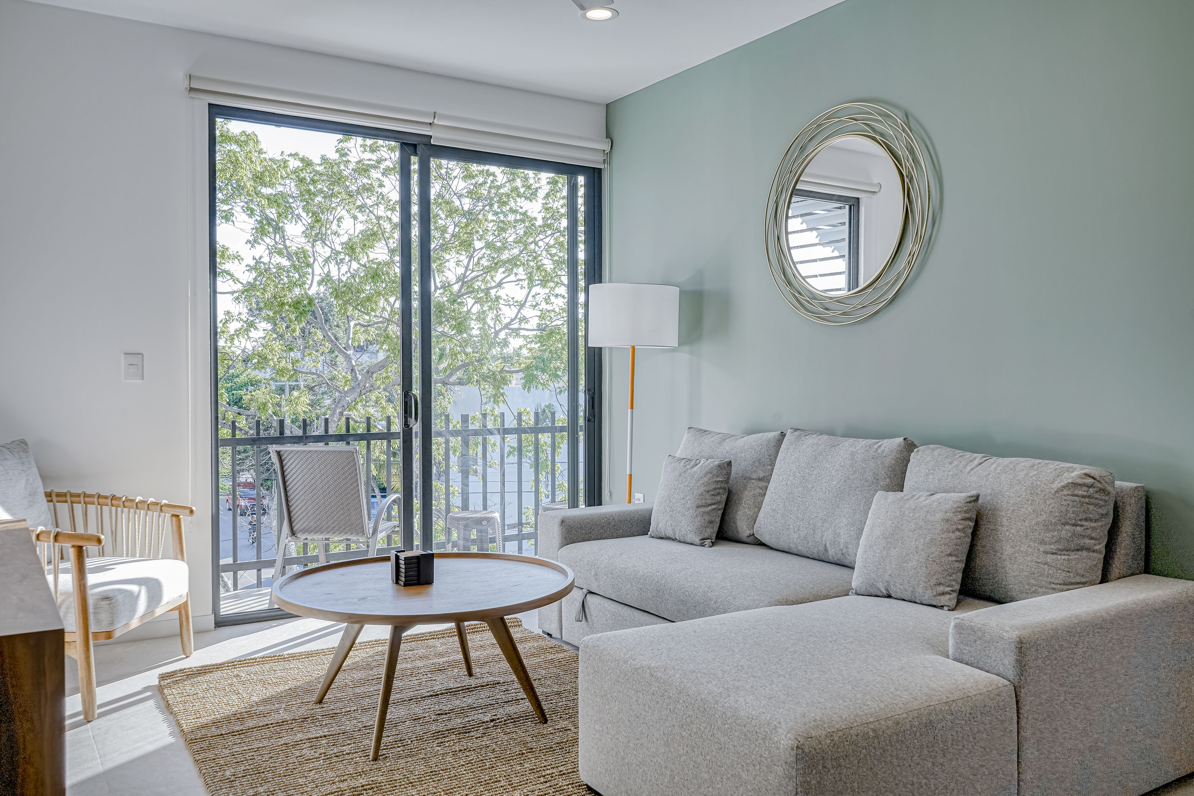 Chic condo with rooftop & courtyard pools, private balcony, & W/D - near beach