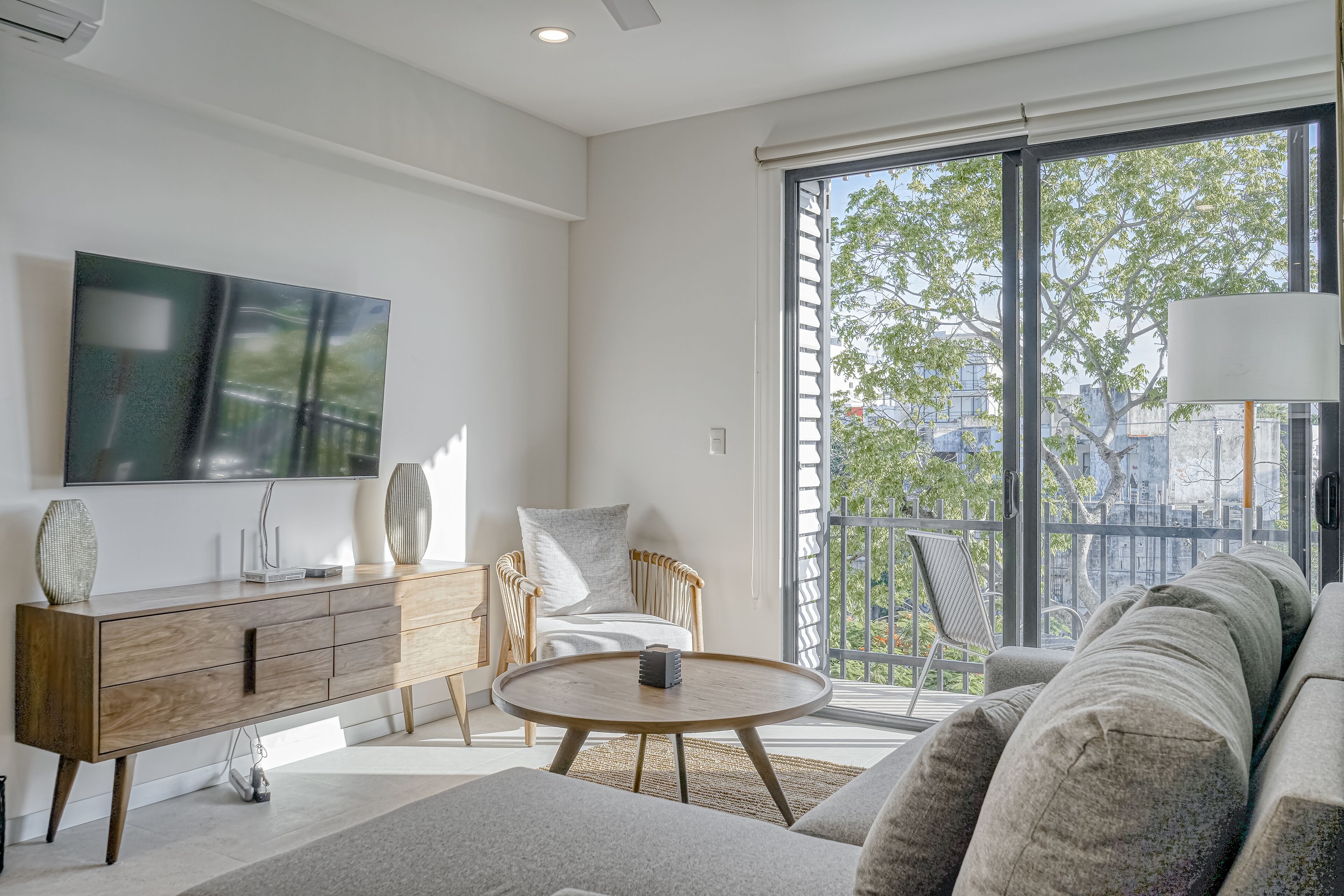 Chic condo with rooftop & courtyard pools, private balcony, & W/D - near beach