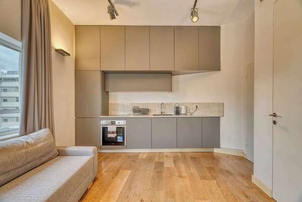 TV - Stylish 1BR in Tel Aviv's Dizengoff Area BY Holiday Rentals ({{addressCityy}})