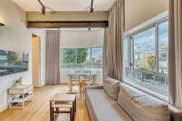 TV - Stylish 1BR in Tel Aviv's Dizengoff Area BY Holiday Rentals ({{addressCityy}})