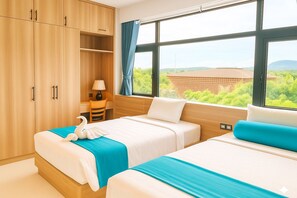 ห้องซูพีเรียทริปเปิล | ผ้าปูที่นอนฝ้ายอียิปต์, เครื่องนอนระดับพรีเมียม, มินิบาร์