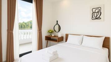Habitación doble Deluxe | Sábanas de algodón egipcio, ropa de cama de alta calidad y minibar