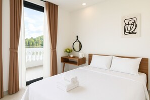 ห้องดีลักซ์ดับเบิล | ผ้าปูที่นอนฝ้ายอียิปต์, เครื่องนอนระดับพรีเมียม, มินิบาร์