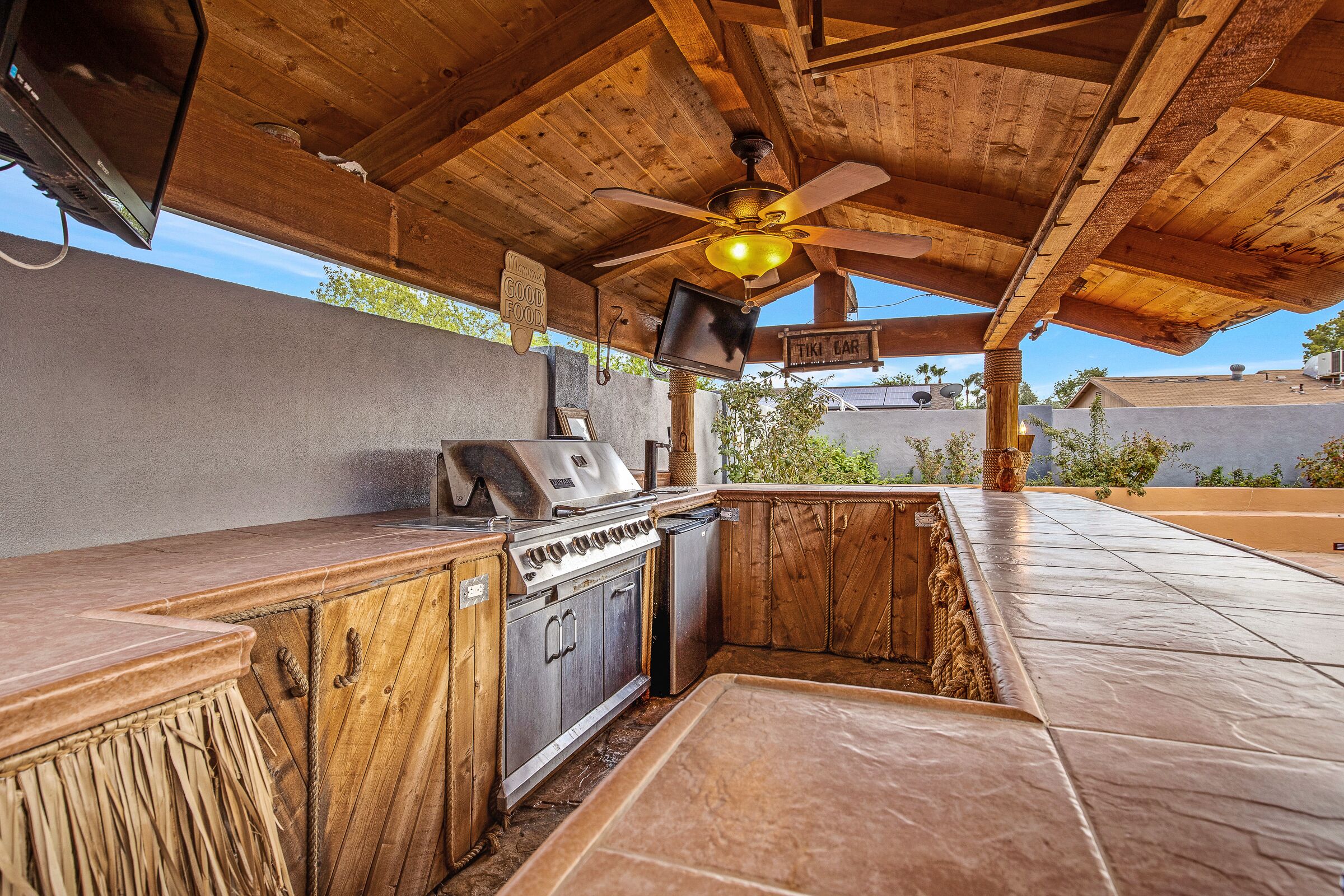 Charming home w/ tiki paradise backyard