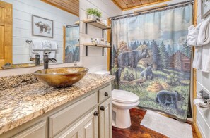 Combined shower/tub, hair dryer, towels, soap