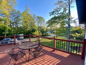 Outdoor dining - Wooded & Quiet, but Downtown. Spacious Home w/ Smokeless Fire Pit, Barrel Sauna (Bellaire)