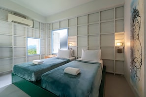 Standaard Twin kamer, 2 eenpersoonsbedden, privébadkamer | Beddengoed