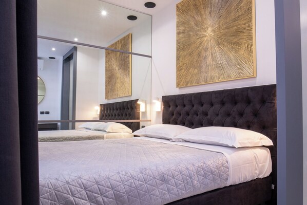 2 habitaciones, tabla de planchar con plancha, wifi y ropa de cama 