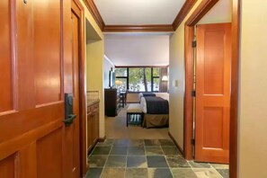 1 bedroom, desk, iron/ironing board, travel crib