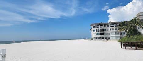 On the beach, sun-loungers, beach towels