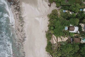 On the beach, sun loungers, beach towels - Beachfront Designer Villa Steps to the Beach • Private Pool (Puntarenas Santa Teresa)