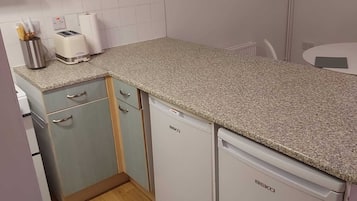 Apartment, Multiple Beds | Private kitchen