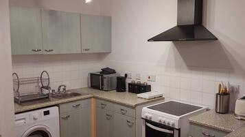 Apartment, Multiple Beds | Private kitchen